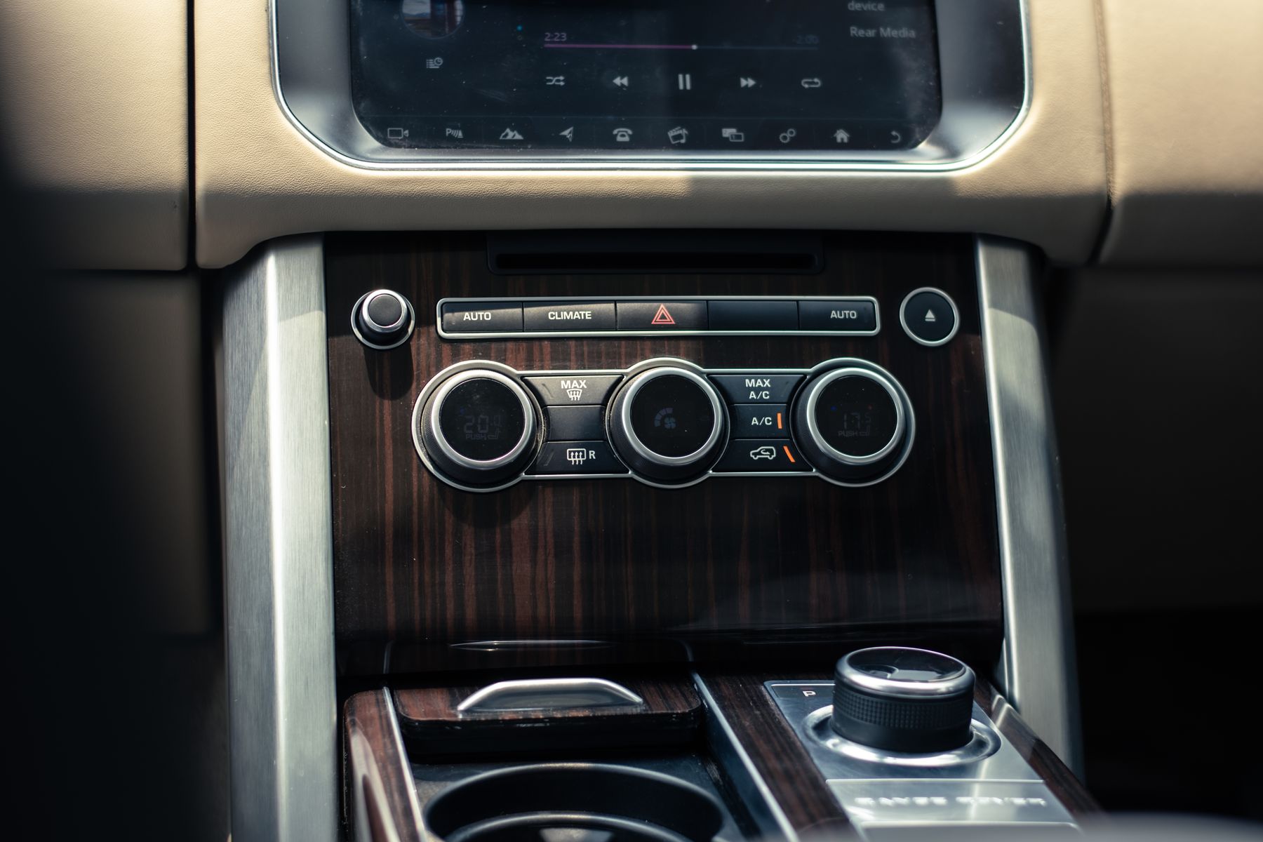 Close view of a vehicle dashboard and steering wheel
